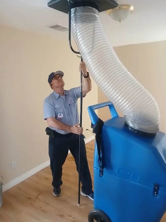 Mini Split Installation technician using HEPA equipment in Eustis